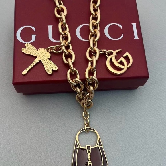Gucci Handbags - Gucci Gold Bag Charm Chain box included NIB
